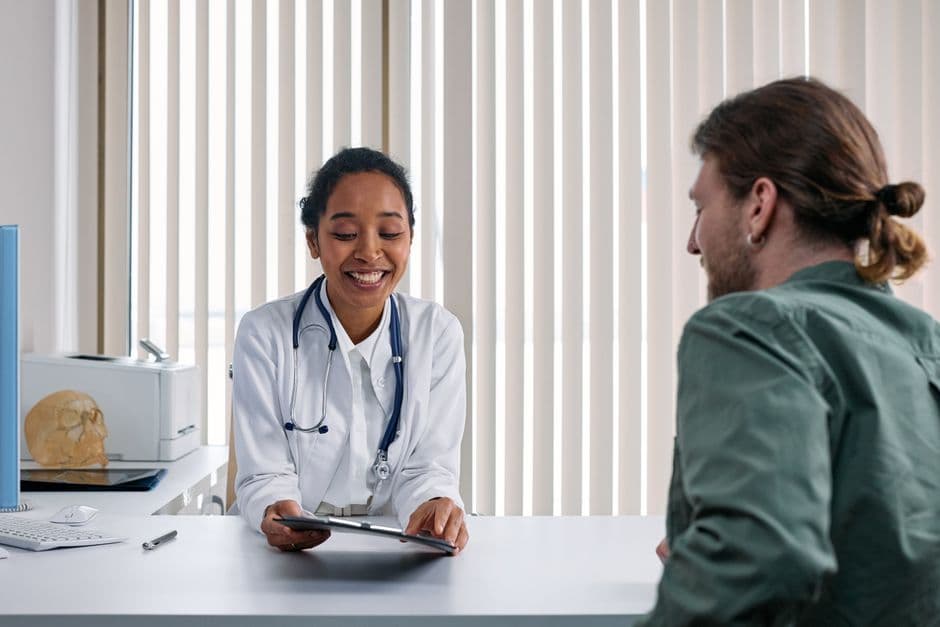 Plastic surgeon and patient in a one-to-one consultation